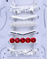 White Nike Air Force 1 sneakers with silver, stars, pearls, red rhinestone shoelace charm decorations