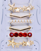 White Nike Air Force 1 sneakers with gold, stars, pearls, red rhinestone shoelace charm decorations