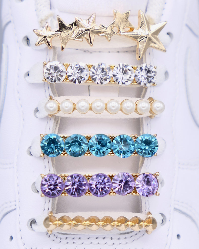 Nike Air Force 1 (AF1) and Air Jordan sneakers with gold, stars, pearls, aqua and violet rhinestone shoelace charm decorations