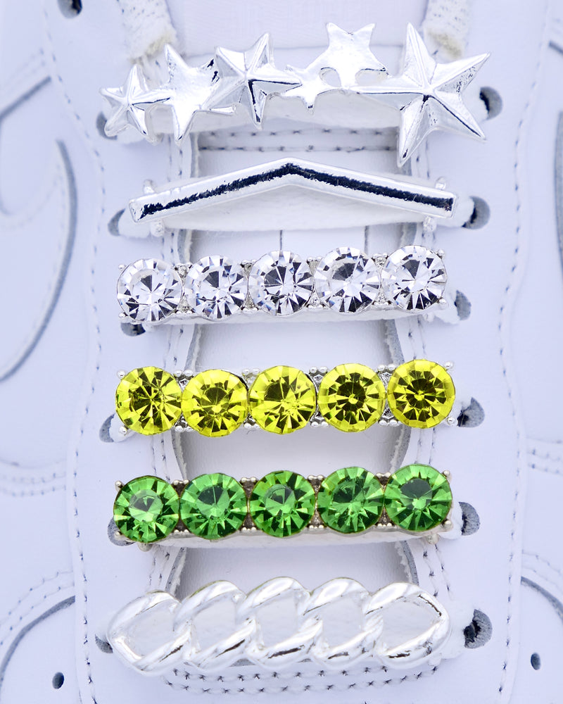 White Nike Air Force 1 and Jordan 1 sneakers with silver,  pearls, yellow and green rhinestone shoelace charm decorations